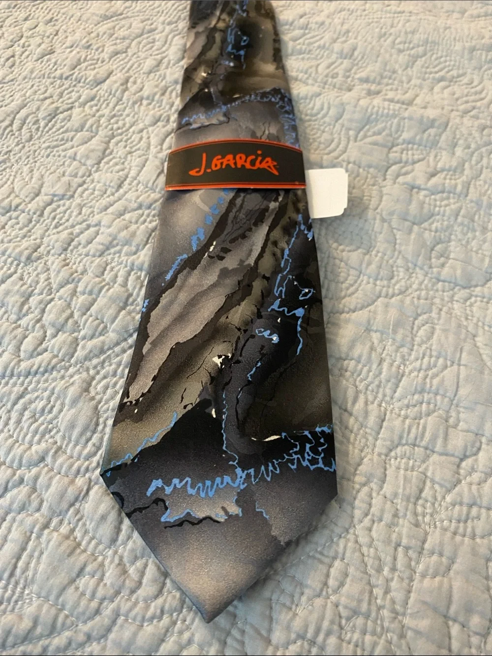 J. Garcia Black Tie with Blue Veining and Orange Logo Band